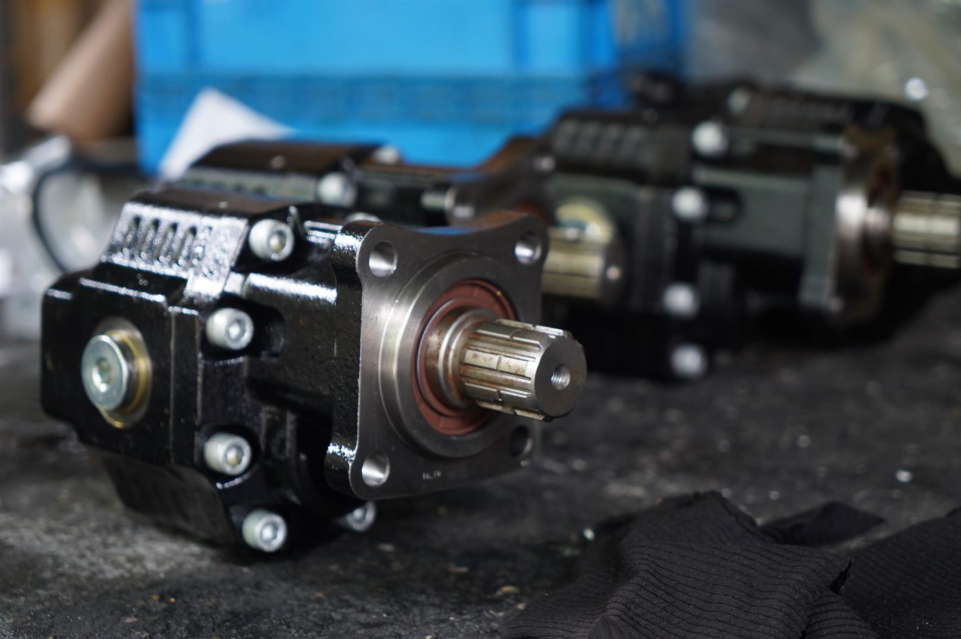 VPS gear pumps on the bench, showing the four-bolt mounting flange and the splined drive shaft