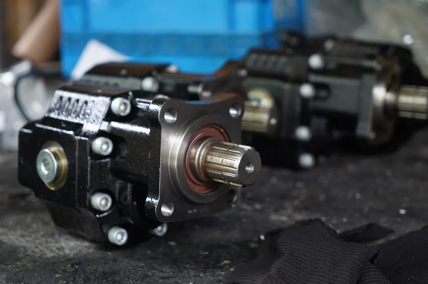 VPS gear pumps on the bench, showing the four-bolt mounting flange and the splined drive shaft