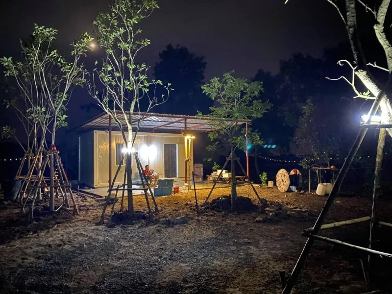 TheContainerTH container house installed, evening view with lighting