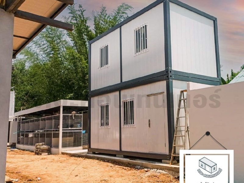 Two-story container house with an adjoining utility yard
