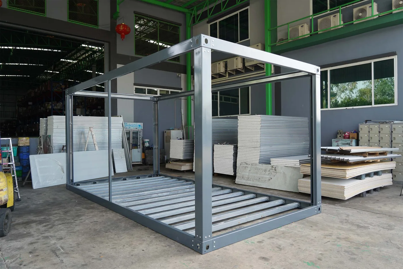 TheContainerTH two-story stacked container house with solar panels