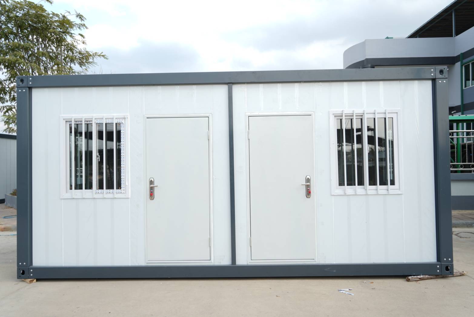 TheContainerTH twin-room container unit — front view with two entrances