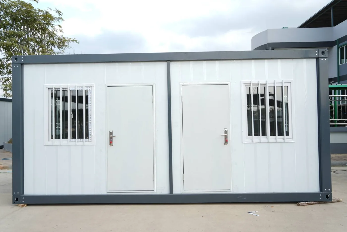 TheContainerTH twin-room container unit — front view with two entrances