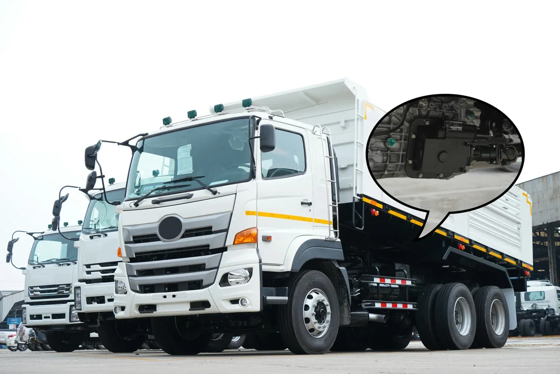 Hino dump truck with a close-up of the gearbox where the VPS PTO is fitted